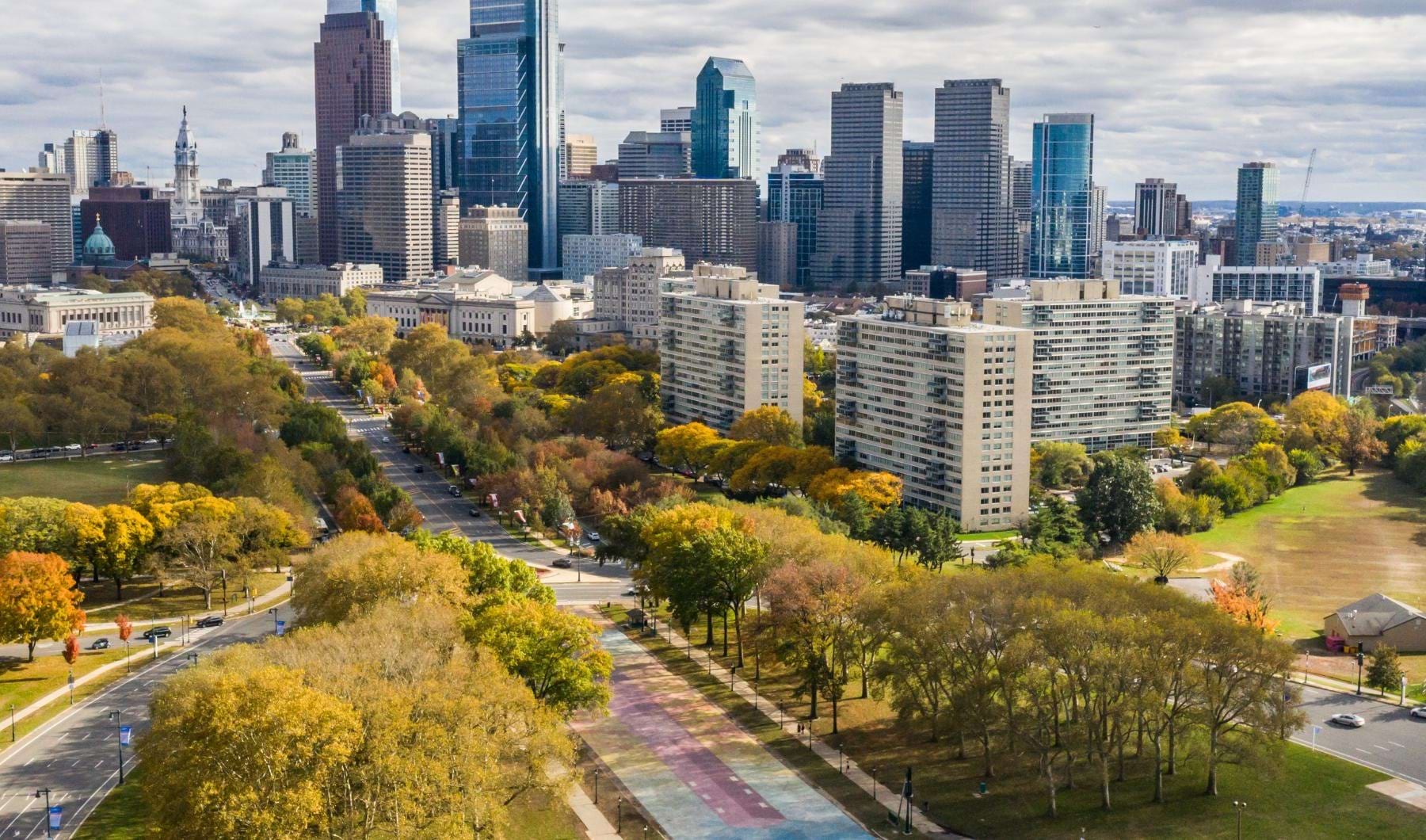 Find your perfect fit at Wynnefield Apartments a park in front of a city